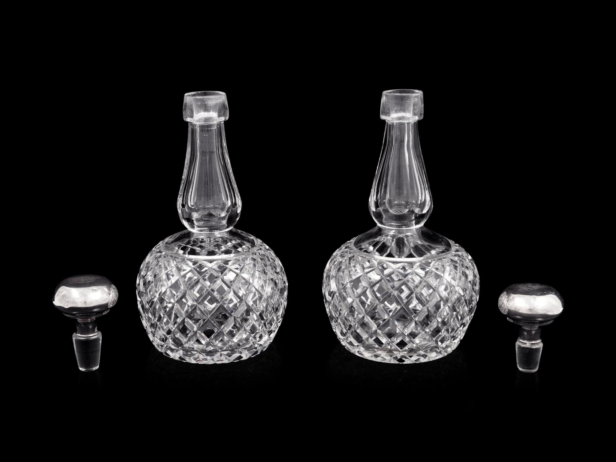 A Pair of American Cut Glass Decanters with Silver Stoppers