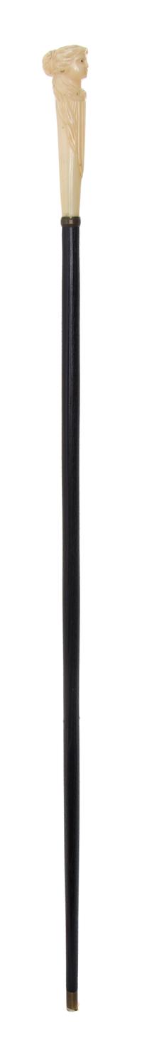 An American Walrus Ivory Handled Cane, Length of handle 5 1/2 x length overall 35 7/8 inches.