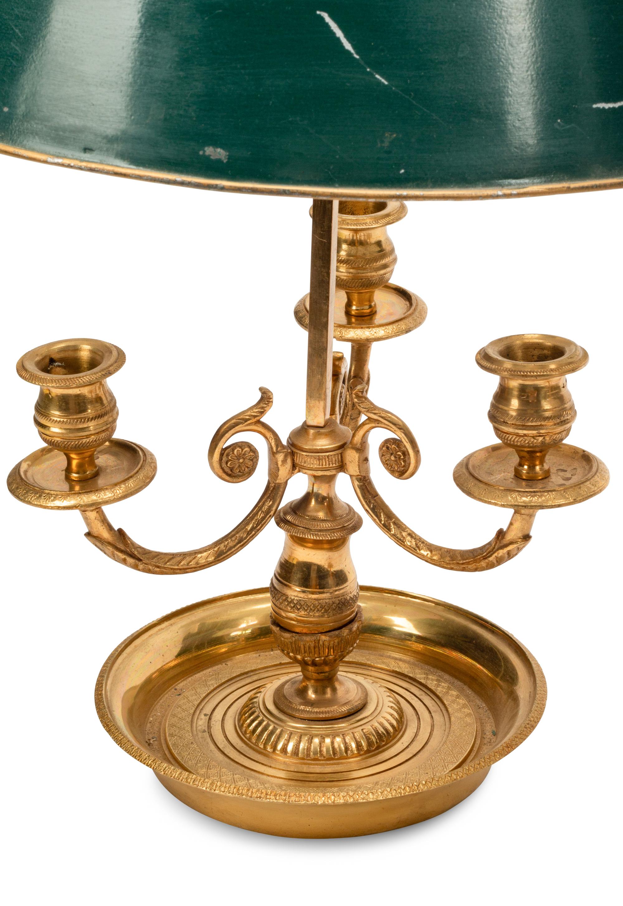 A Pair of Brass Bouillotte Lamps with Tole Shades