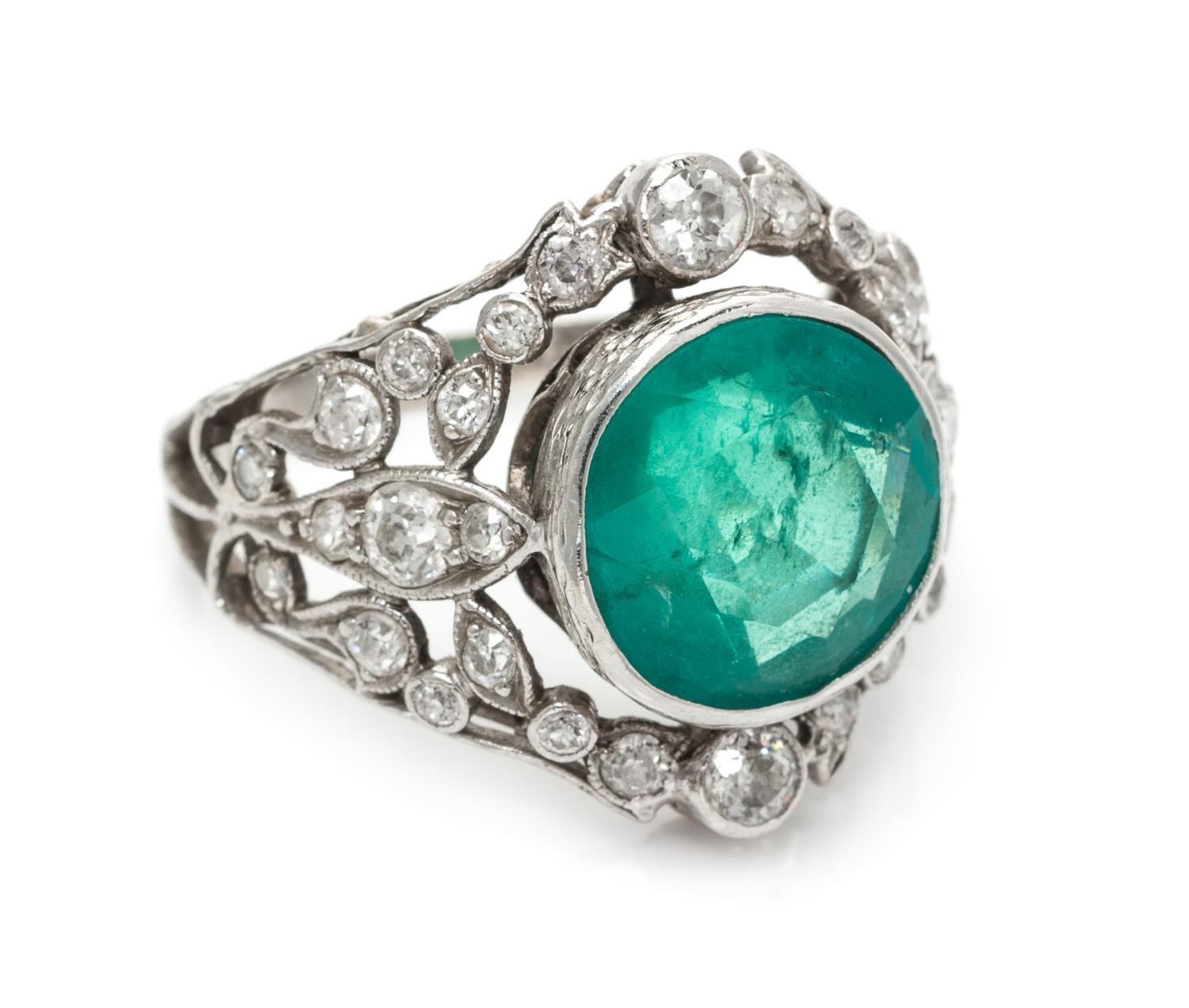 An Edwardian Platinum, Gold, Emerald and Diamond Ring, 4.80 dwts.