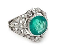 An Edwardian Platinum, Gold, Emerald and Diamond Ring, 4.80 dwts.