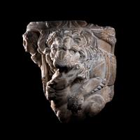 A Roman Marble Sarcophagus Fragment with a Lion