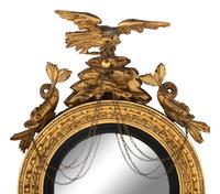 A Classical Giltwood and Gesso Cut-Glass Mounted Two Light Girandole Bull's Eye Mirror