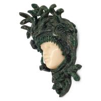 A Carved Green and Yellow Aventurine Medusa Wall Ornament