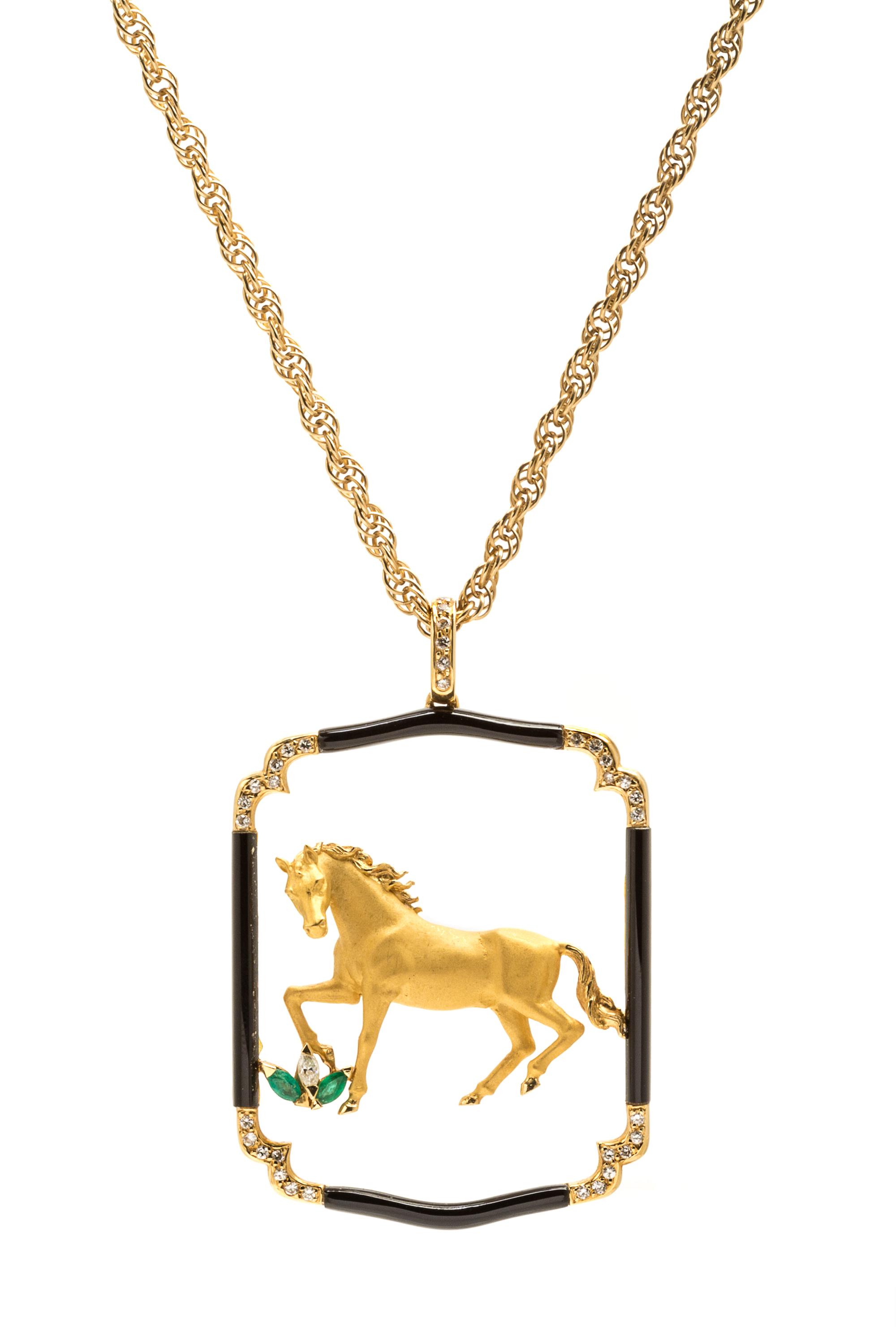 A Yellow Gold, Onyx, Diamond and Emerald Horse Motif Pendant, 12.90 dwts.