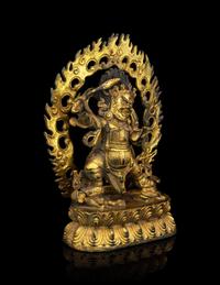 A Sino-Tibetan Gilt Bronze Figure of Mahākāla