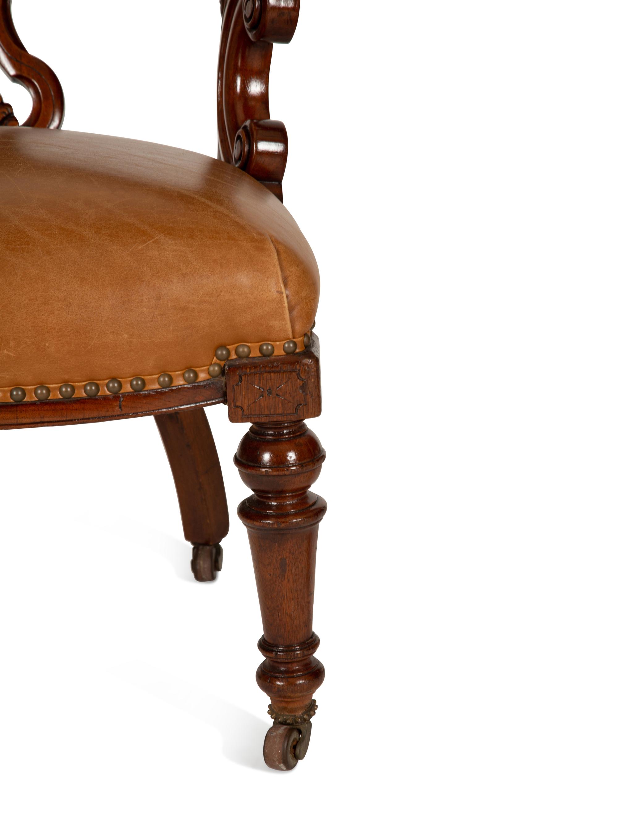 A Pair of William IV Style Leather-Upholstered Mahogany Armchairs