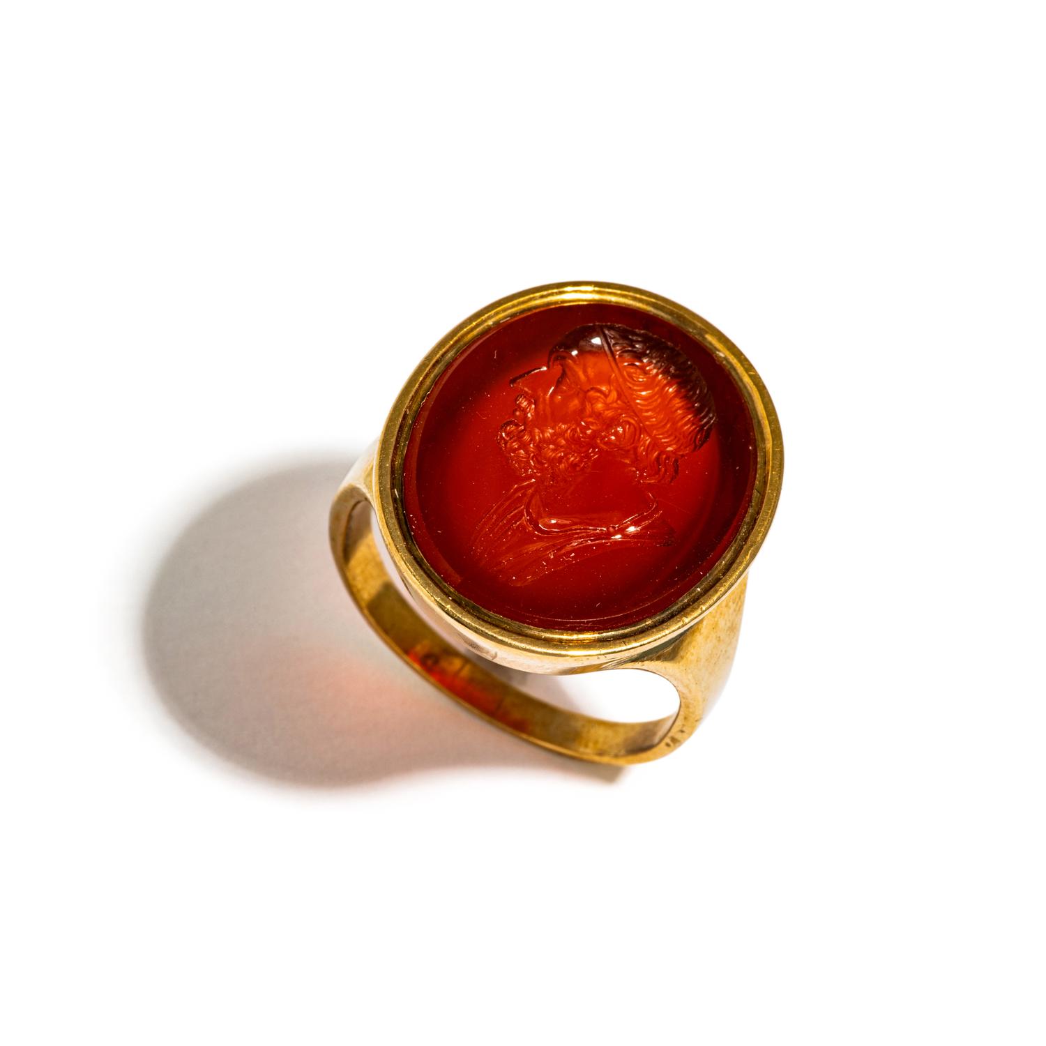 A Neoclassical Gold and Carnelian Finger Ring with Portrait Head of Homer