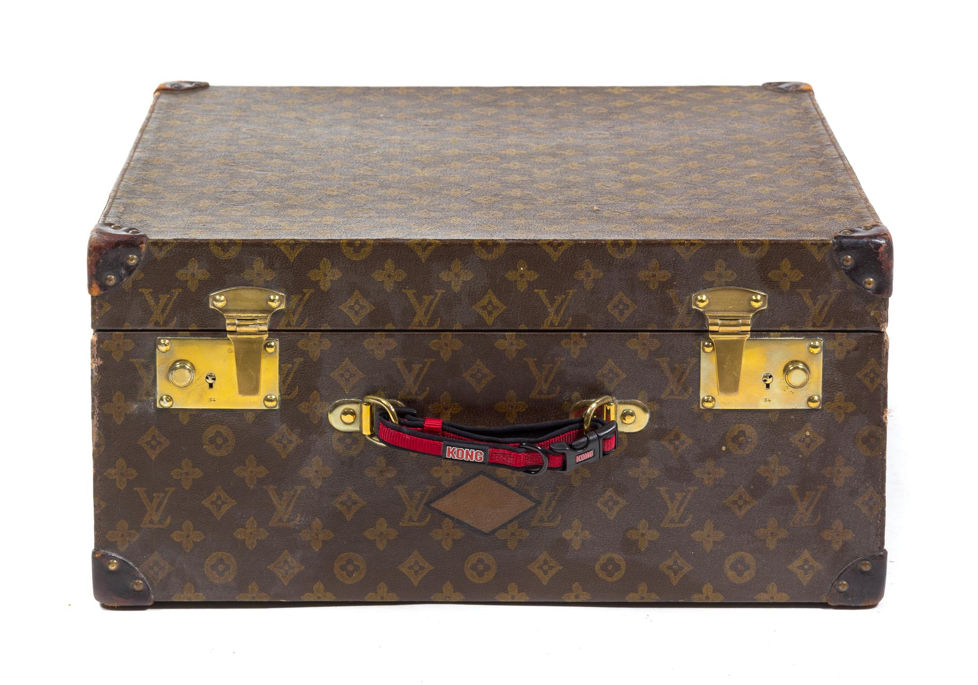 A Louis Vuitton Monogram Canvas Hardsided Case Height 19 1/2 x width 19 1/2 x depth 9 1/4 inches.