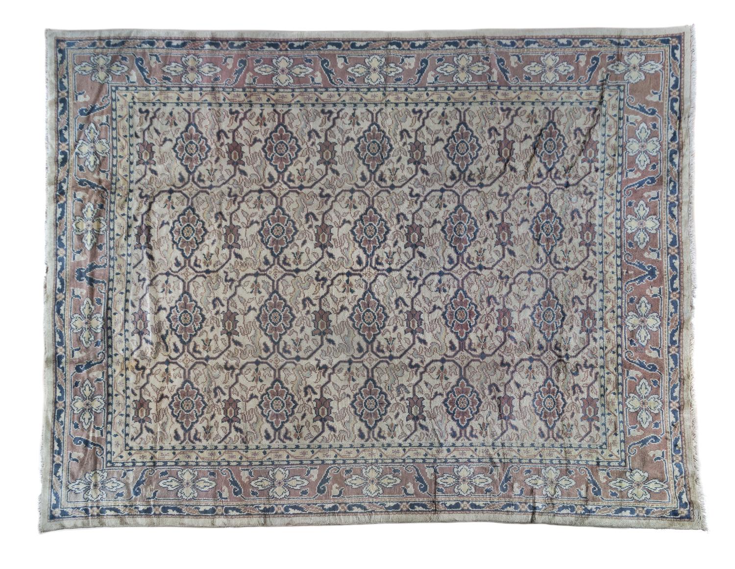 An Oushak Wool Rug 14 feet x 10 feet 8 inches.