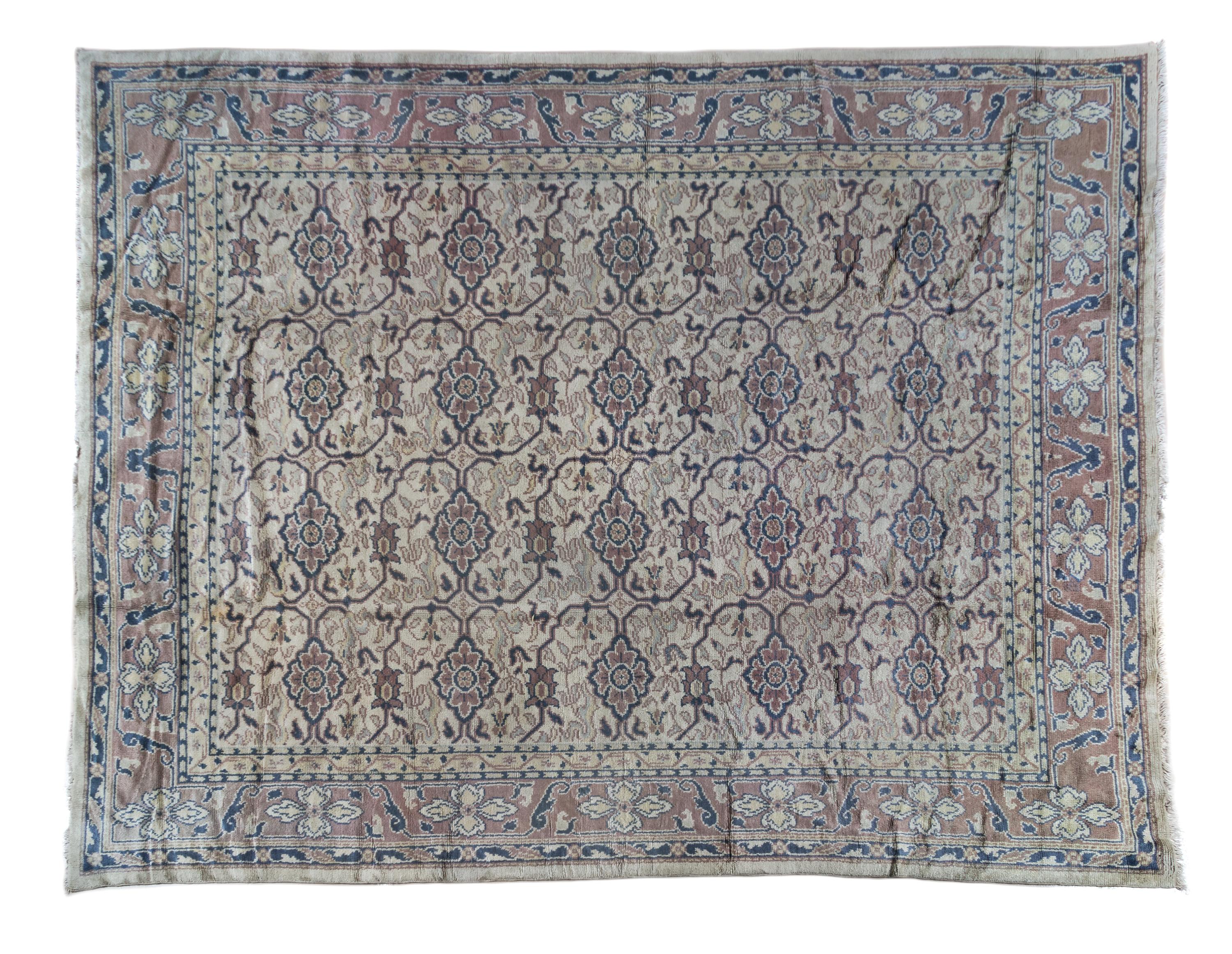 An Oushak Wool Rug 14 feet x 10 feet 8 inches.