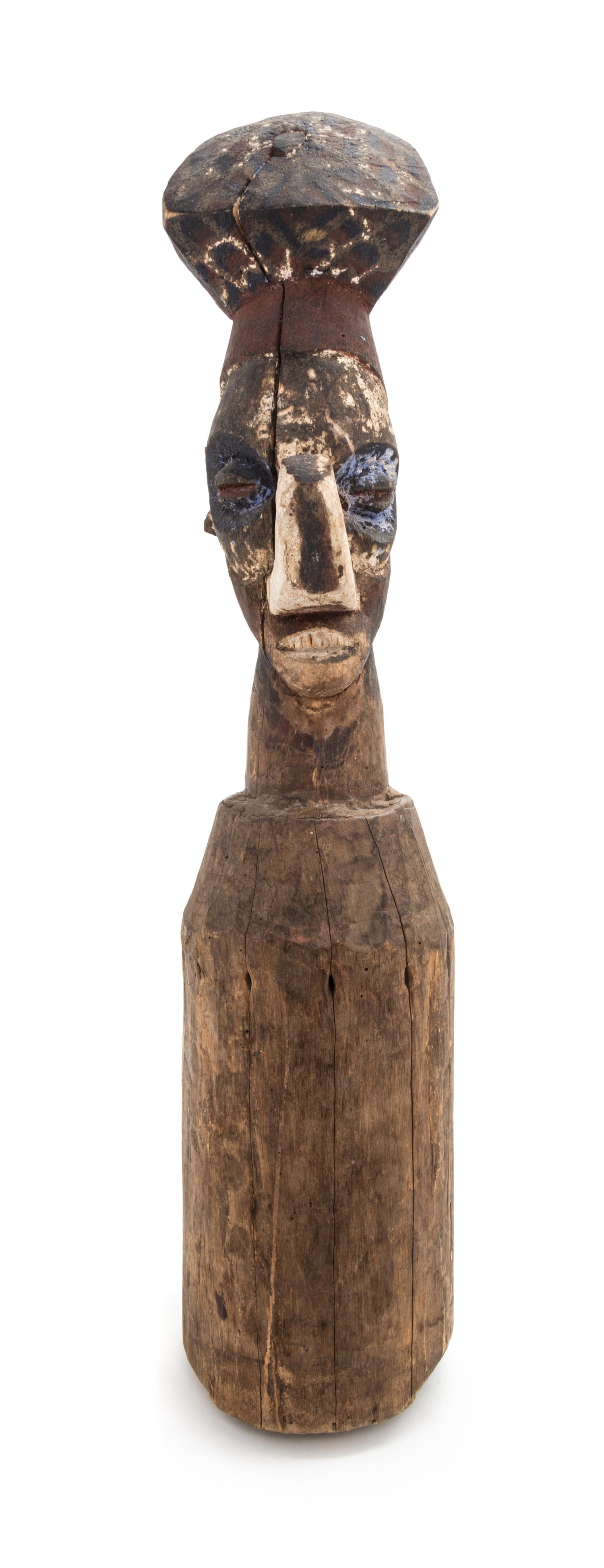 An African Carved Wood Yaka Pounder, Congo Height 23 x diameter 4 1/2 inches.