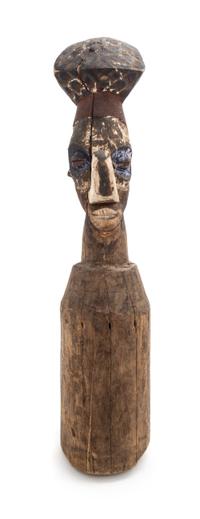 An African Carved Wood Yaka Pounder, Congo Height 23 x diameter 4 1/2 inches.