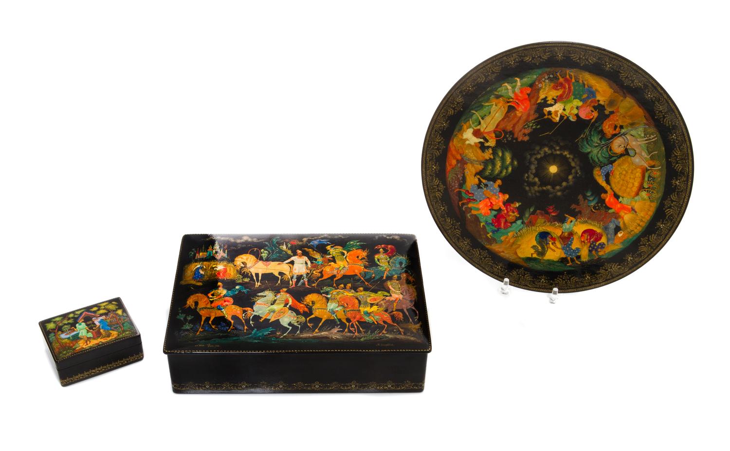 A Russian Lacquered Box, 20th Century, decorated with figures on horseback; together with a Russian lacquered dish and box.