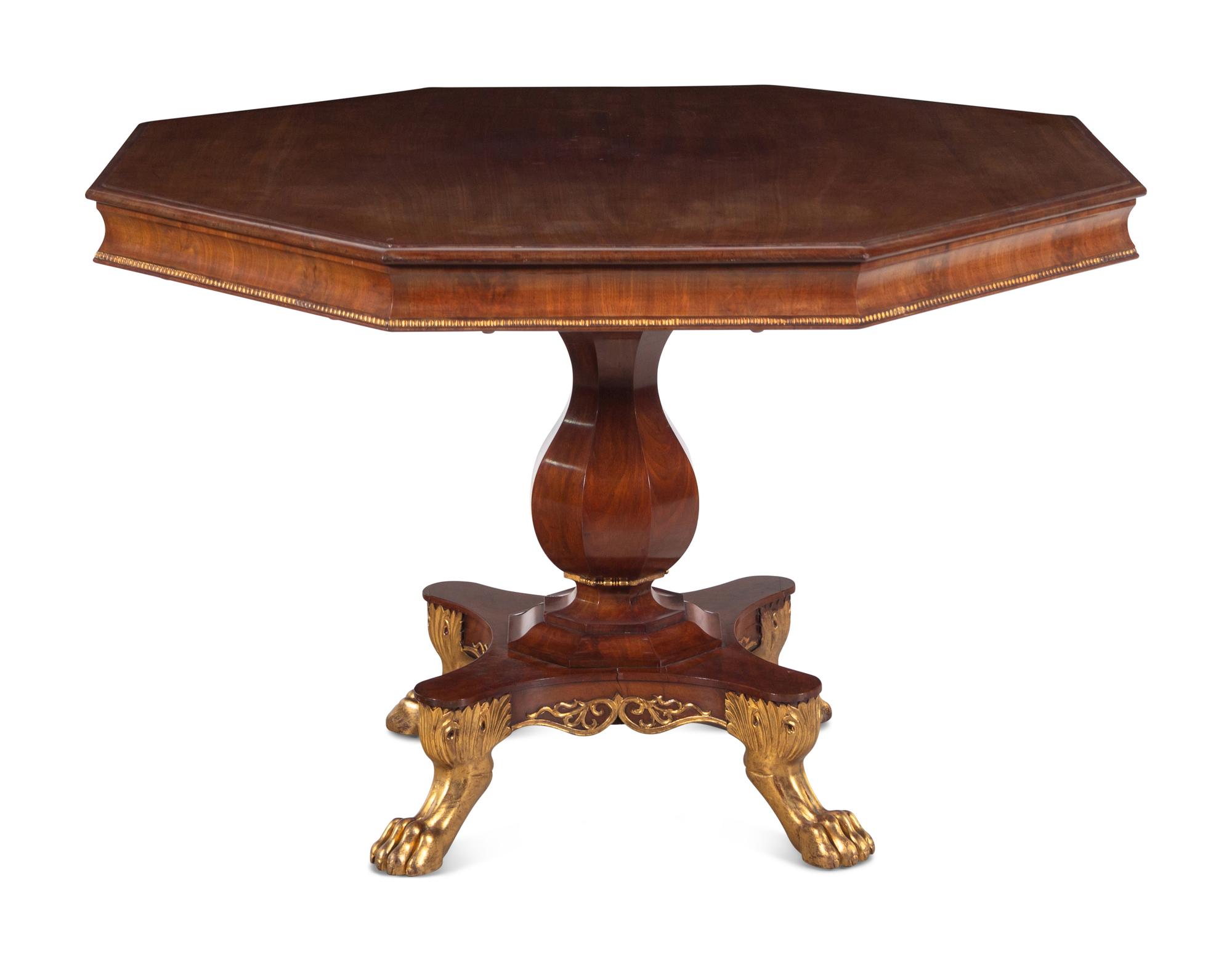 A Regency Parcel-Gilt Walnut Center Table