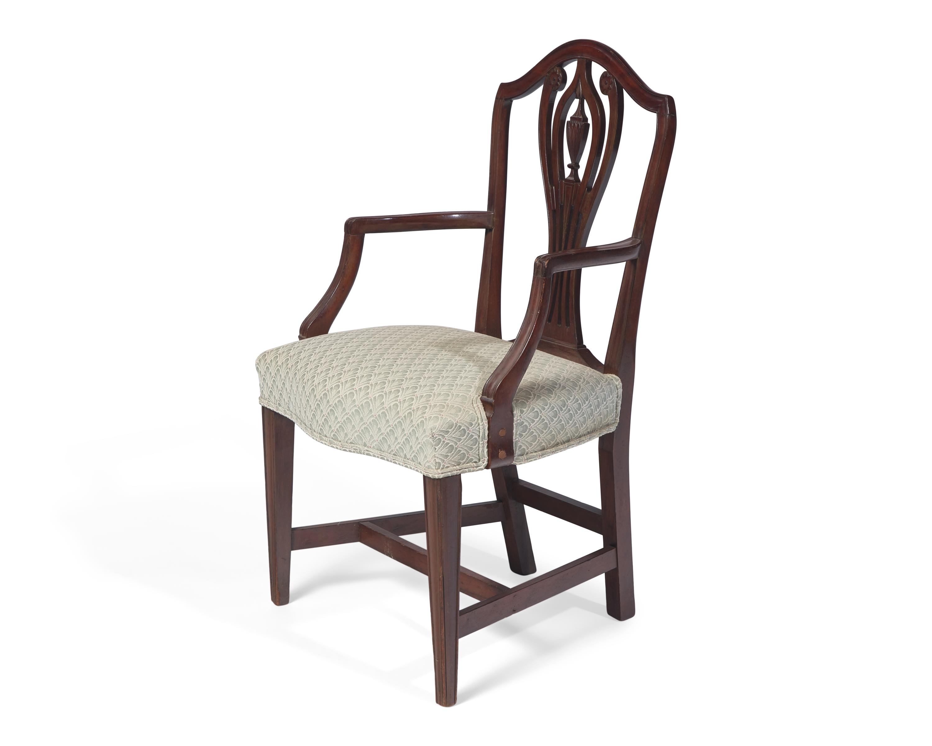 A Set of Eight Federal Carved Mahogany Dining Chairs