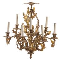 A Louis XV Style Gilt Bronze Eight-Light Chandelier Diameter 21 1/2 inches. — 20TH CENTURY