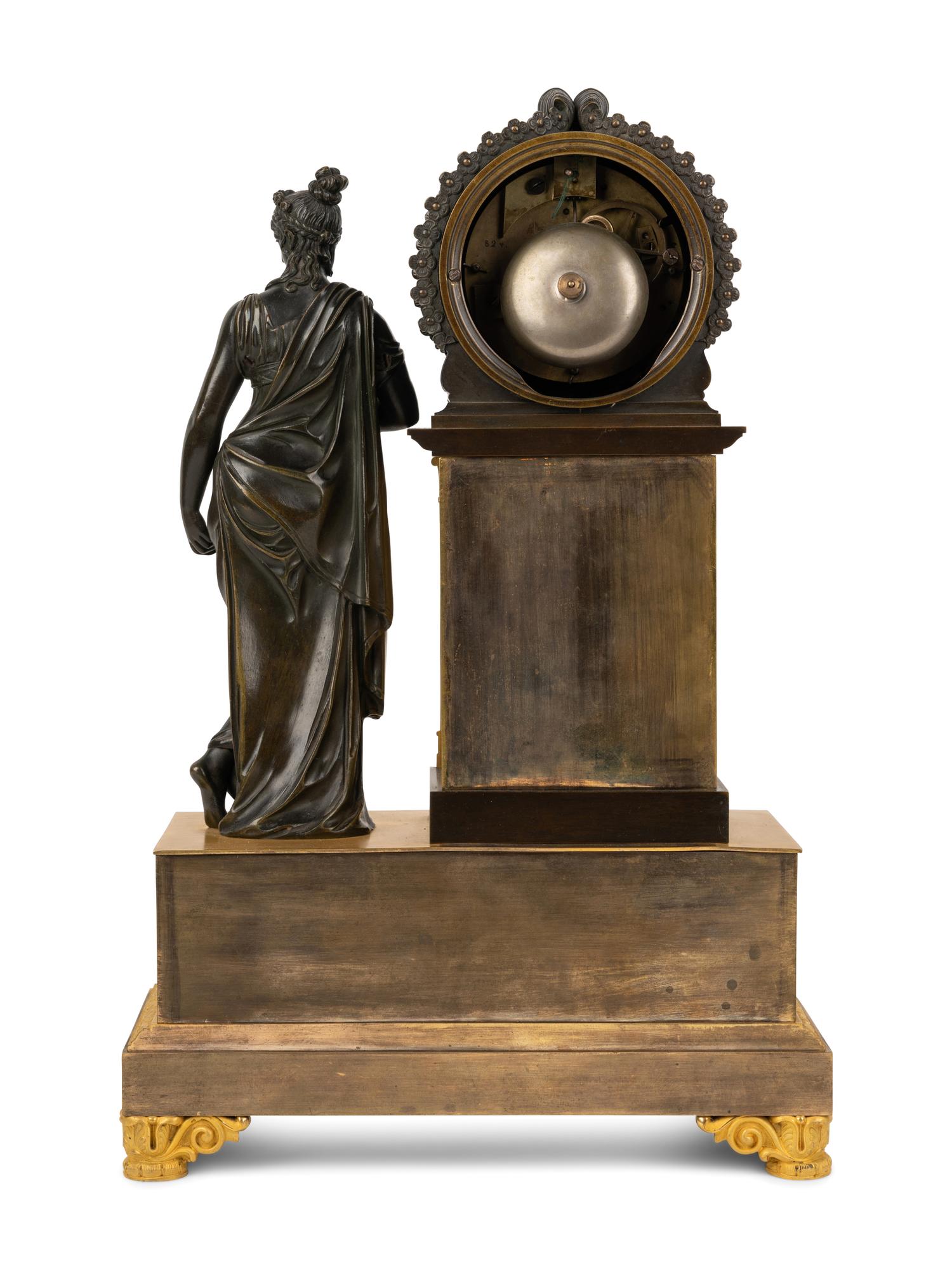 A French Gilt and Patinated Bronze Figural Mantel Clock