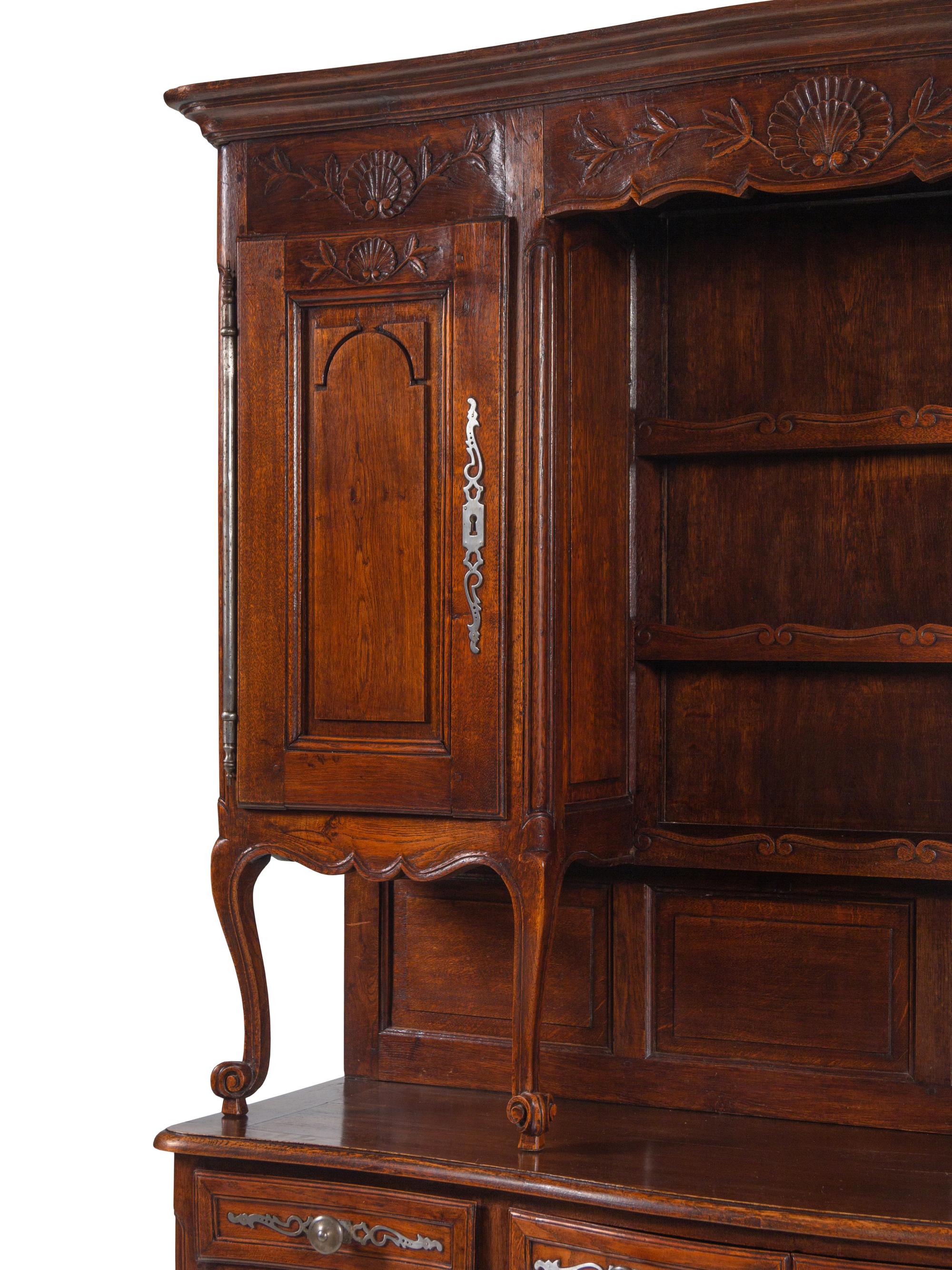 A Louis XV Provincial Carved Walnut Buffet à Deux Corps
