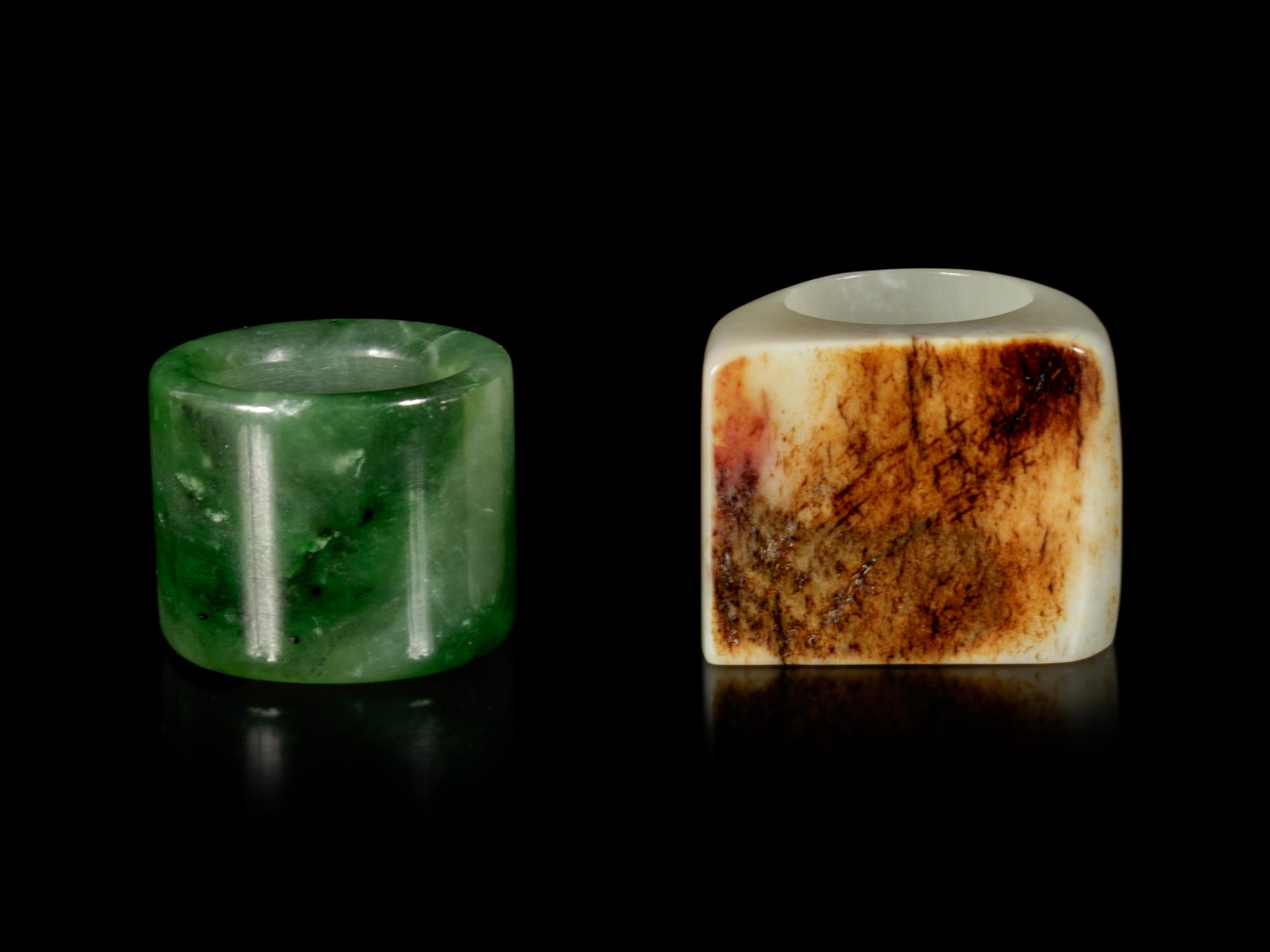 Two Chinese Jade and Hardstone Archer's Rings