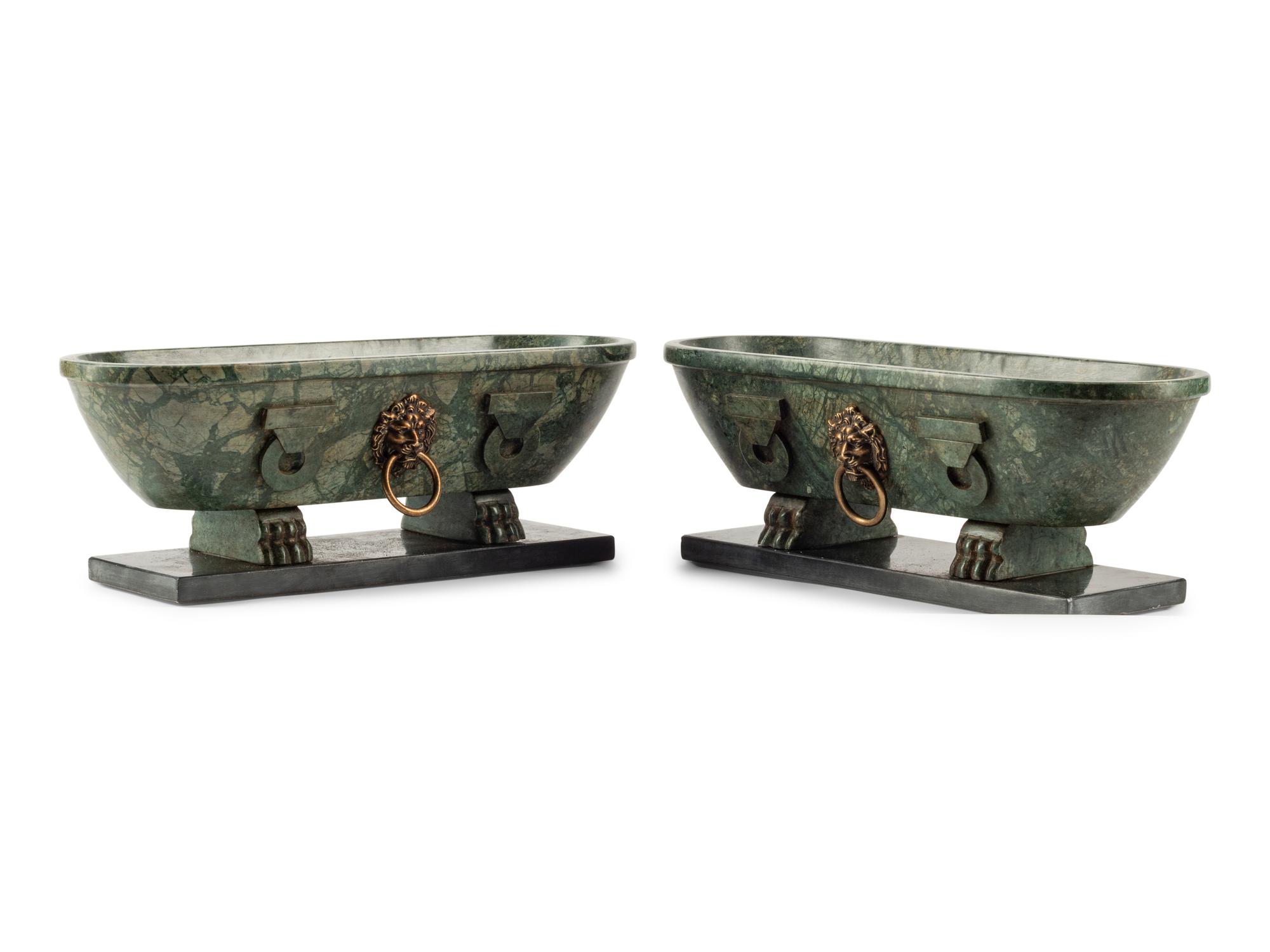 A Pair of Grand Tour Style Marble Sarcophagi