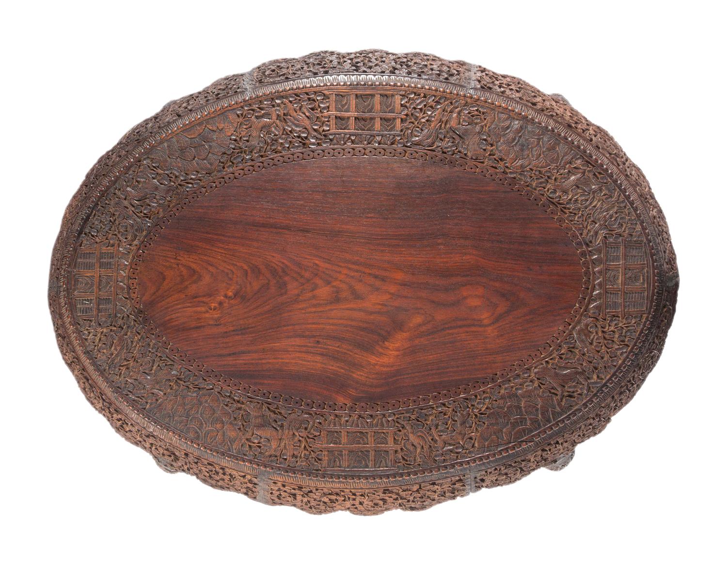 An Anglo-Indian Carved Teakwood Table