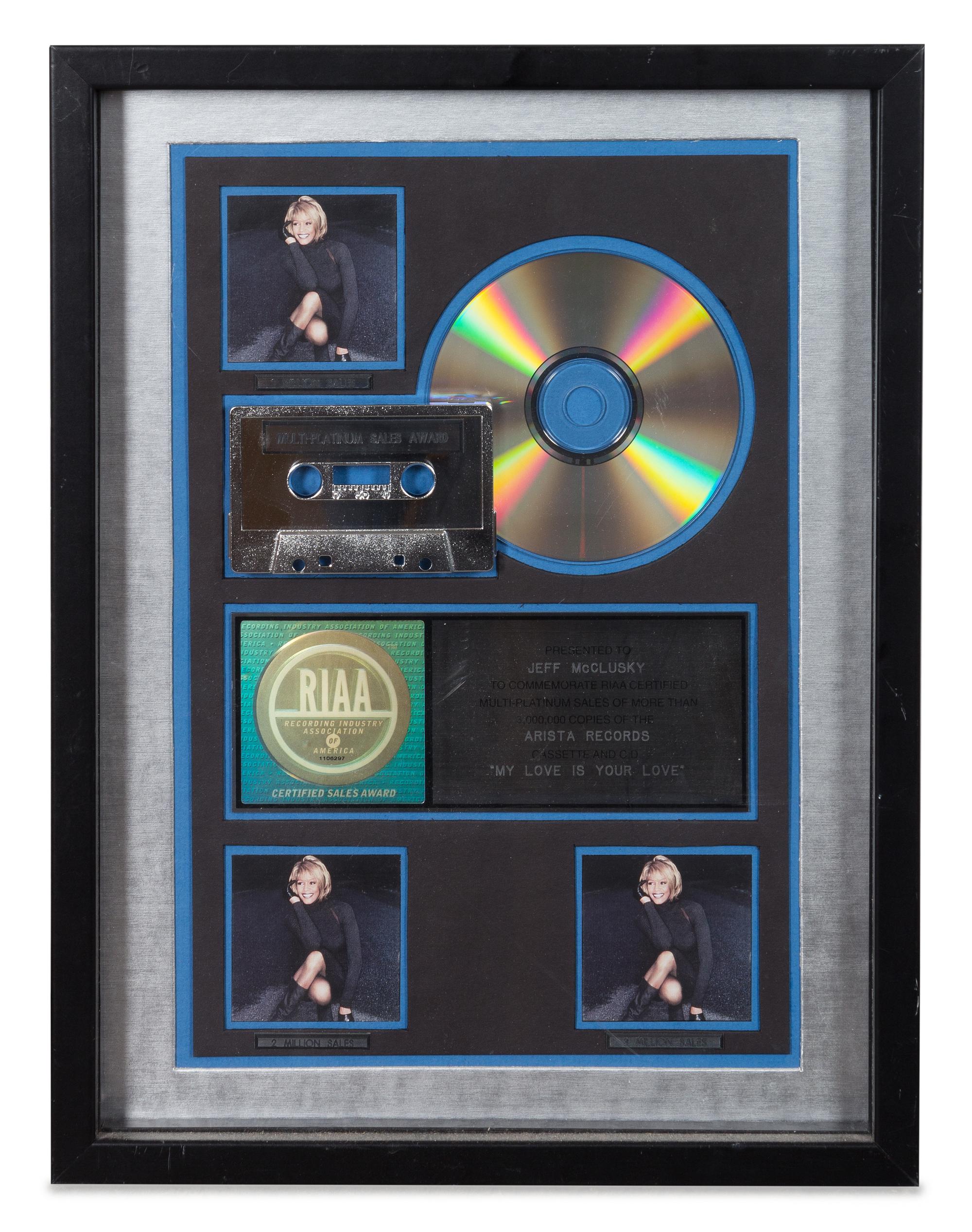 A Whitney Houston: My Love is Your Love RIAA Certified 3x Platinum Presentation Album 17 x 12 3/4 inches.