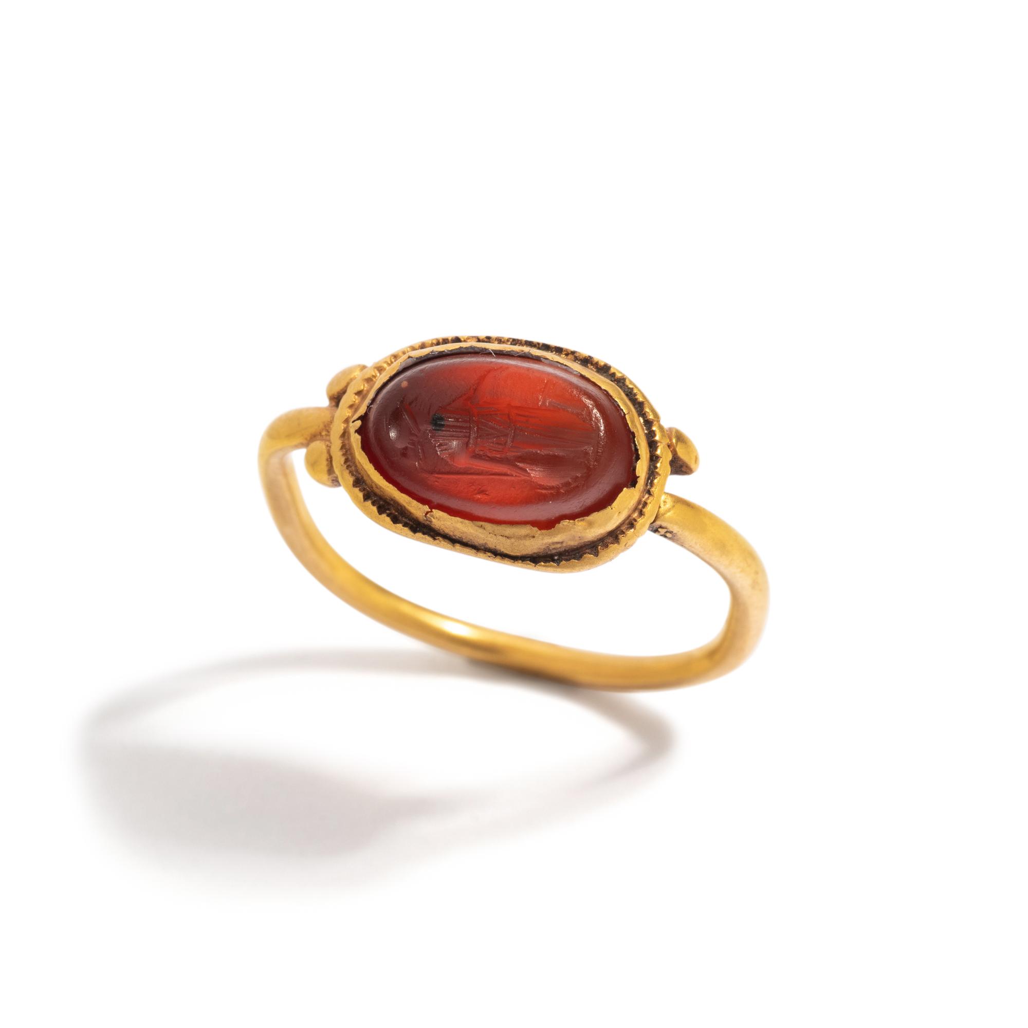 A Roman Gold and Carnelian Finger Ring with the Goddess Minerva