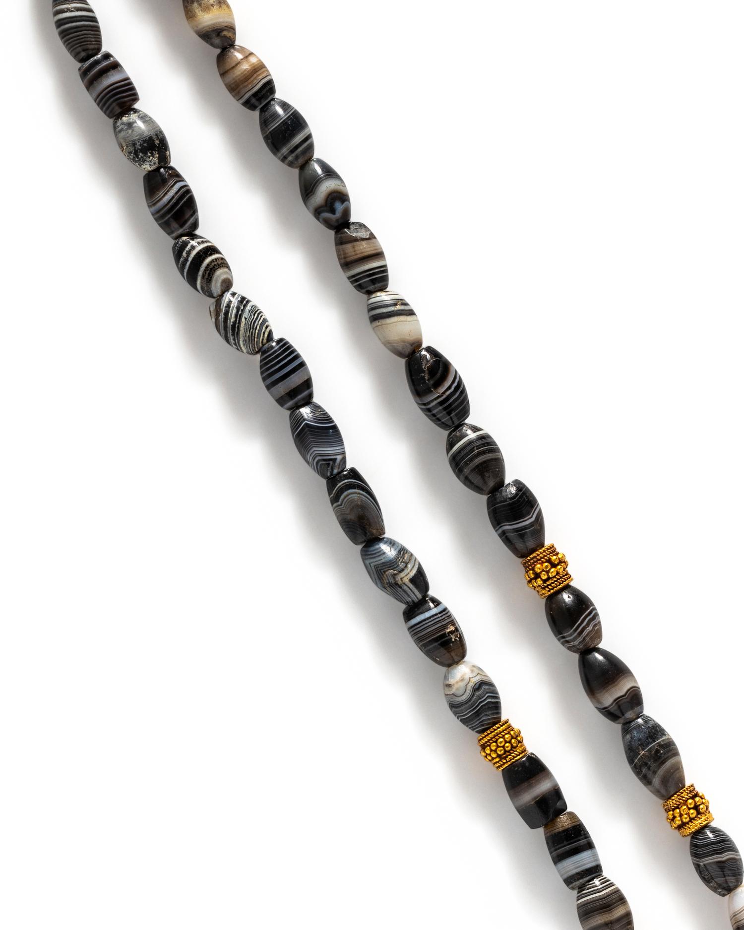 A Western Asiatic Gold and Banded Agate Bead Necklace