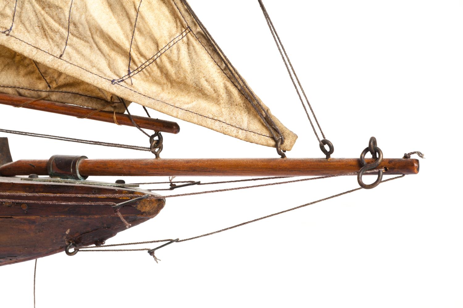 A Brass Mounted Painted Wood Pond Boat