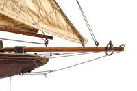 A Brass Mounted Painted Wood Pond Boat