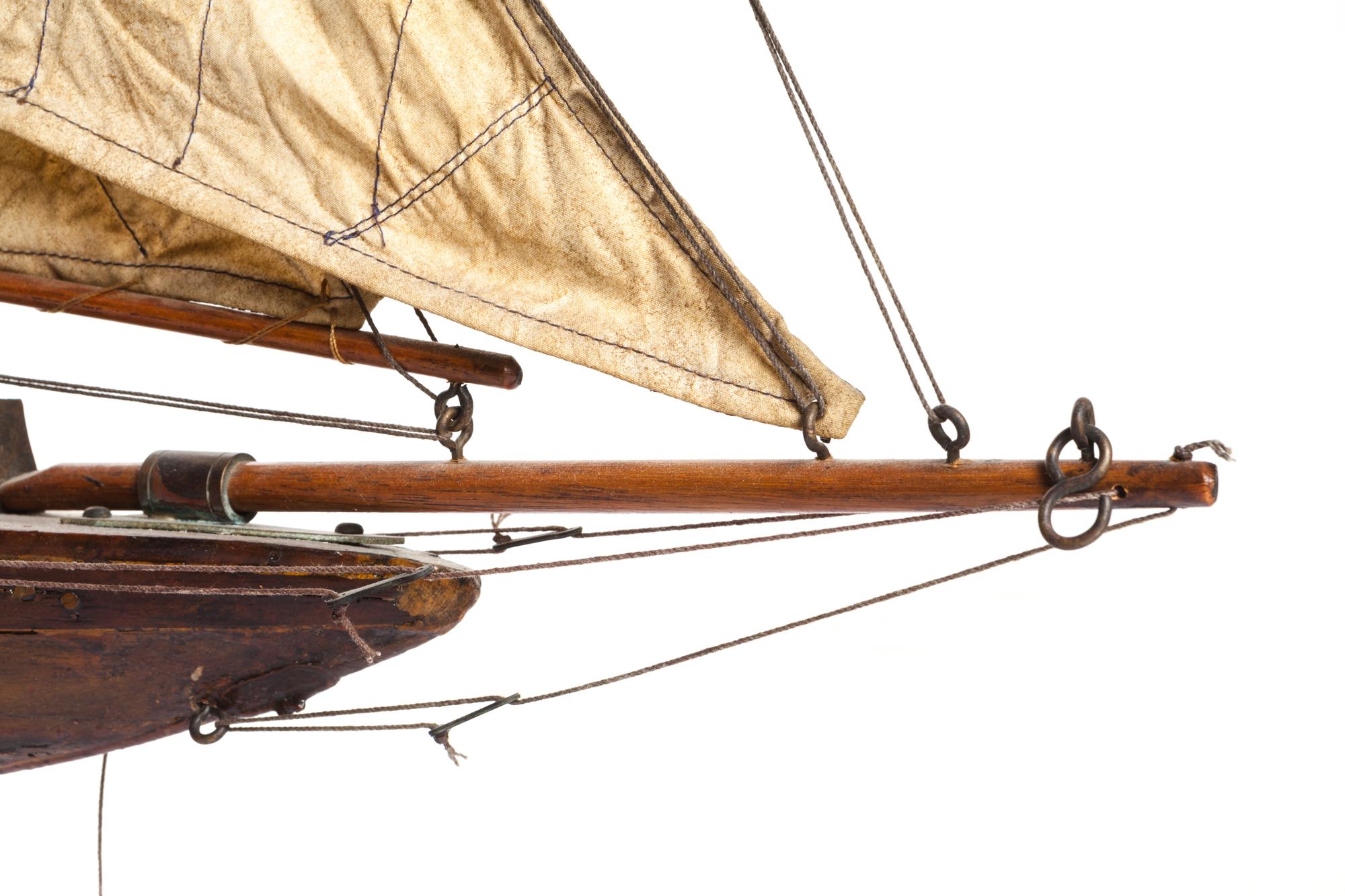 A Brass Mounted Painted Wood Pond Boat