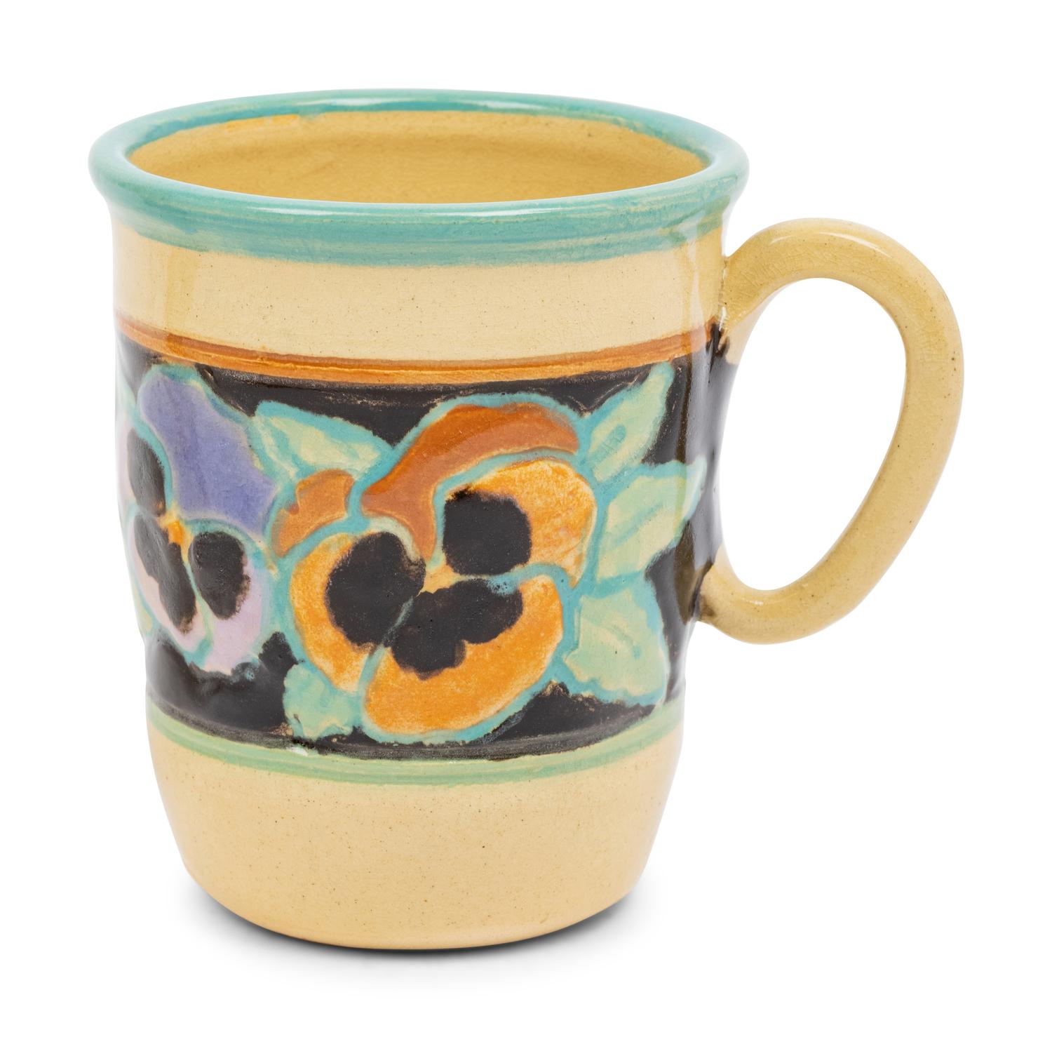A Set of Dan Bleier Studio Ceramic Plates and Mugs