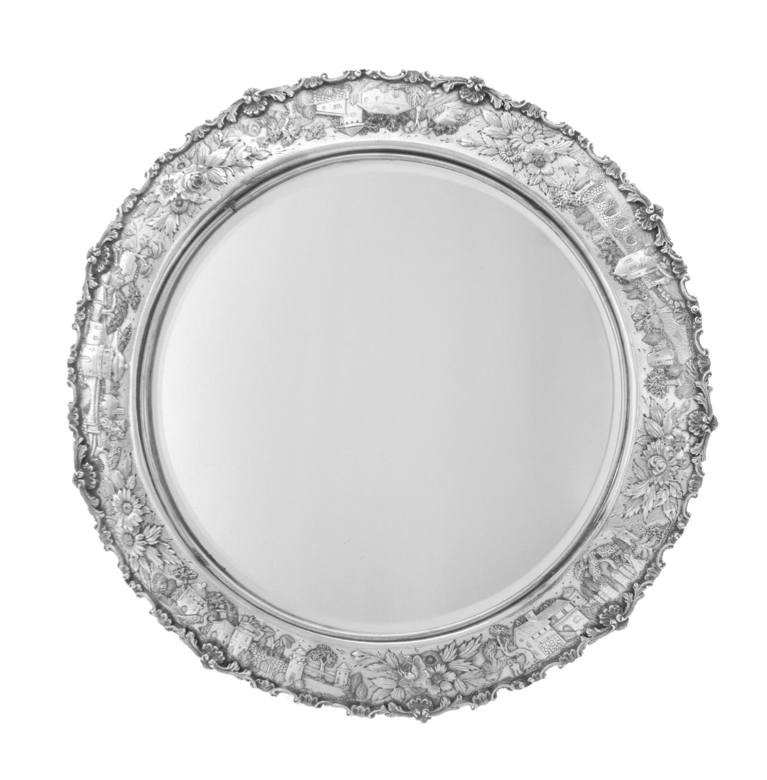 An American Silver Table Plateau, S. Kirk & Son, Baltimore, MD, the circular mirror within the border worked to show repousse garden sc