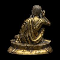 A Sino-Tibetan Gilt Bronze Figure of Milarepa 銅米拉日巴尊者像