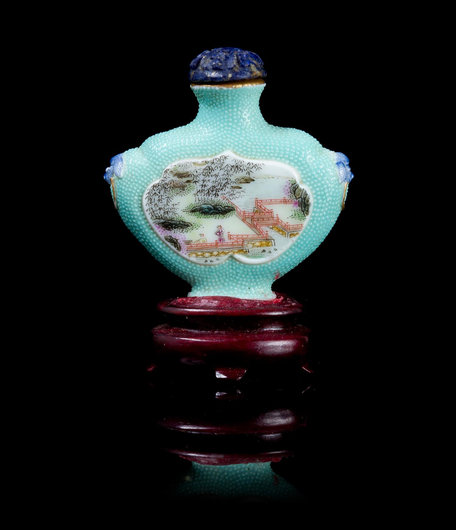 A Famille Rose Porcelain Snuff Bottle Height overall 2 5/8 inches.