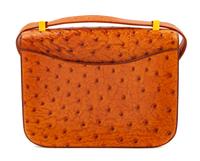 An Hermès Cognac Ostrich Constance Bag, 7" H x 9" W x 2" D; Strap drop: 14" or 8.5".