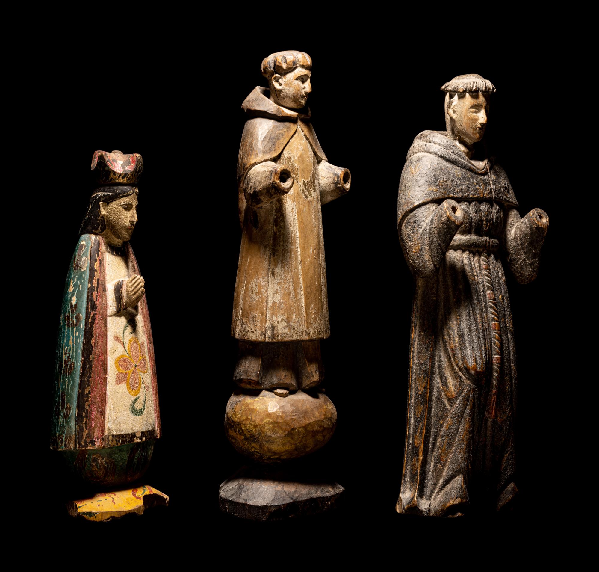 Three Spanish Colonial Carved Wood Santos Figures