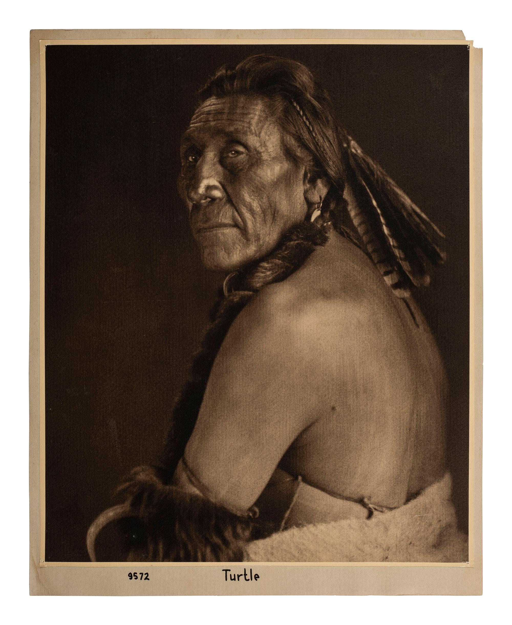 [NATIVE AMERICANS]. HILEMAN, Tomar J. (1882-1945), photographer. Turtle. [Kalispell, Montana, ca 1911]. Photograph originally displayed at Hileman's studio.