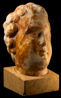 A Large Roman Marble Portrait Head of a Youth
