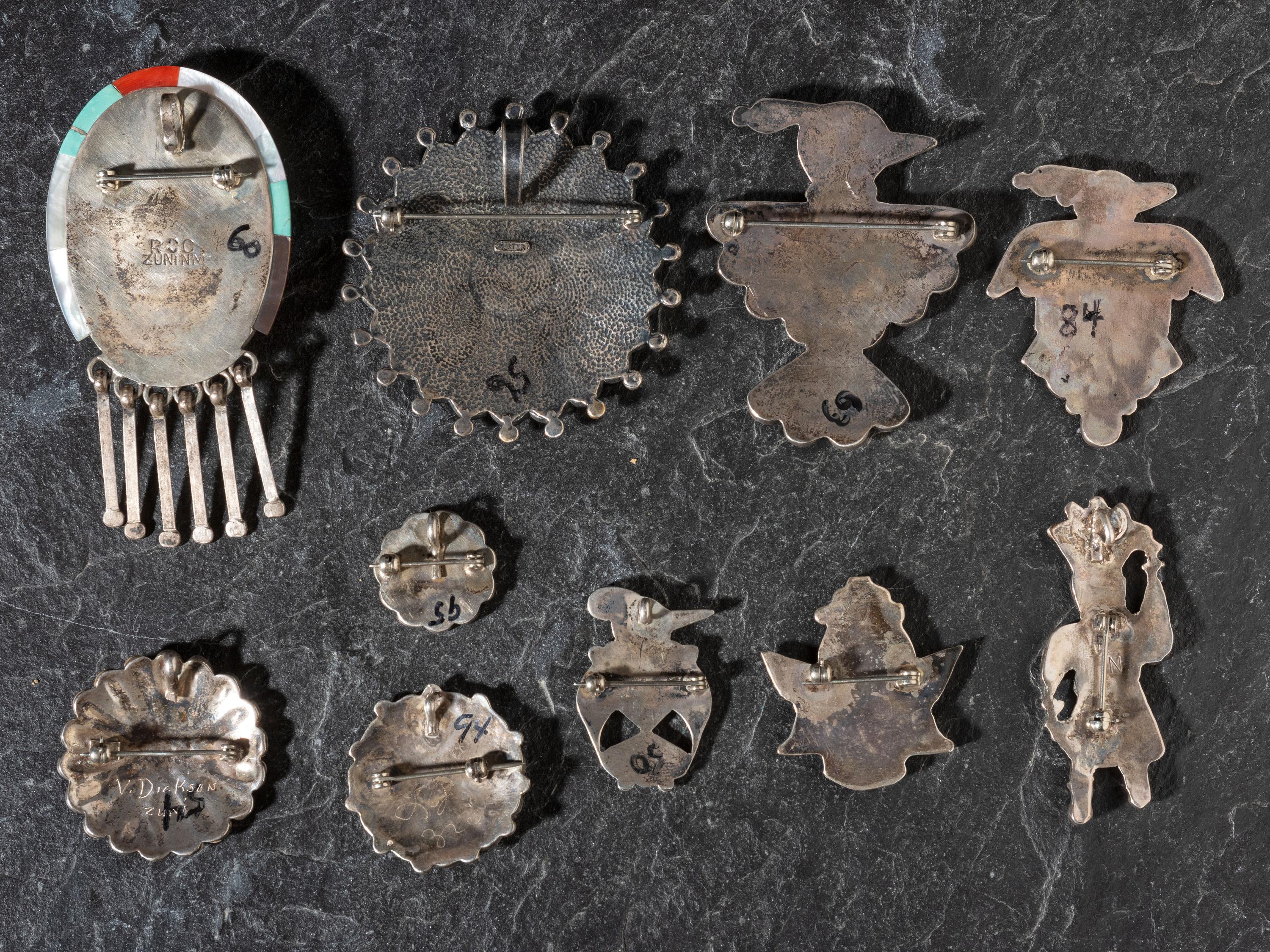 An Assortment of Zuni Mosaic Inlay Pins / Pendants
