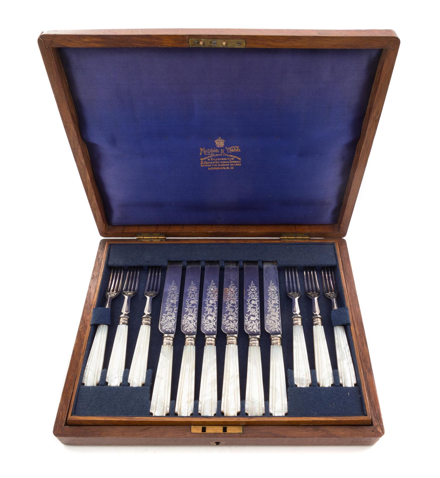 An English Silver-plate Dessert Service, retailed by Mappin & Webb, London, comprising 12 knives and 12 forks, each with mother-of-pear