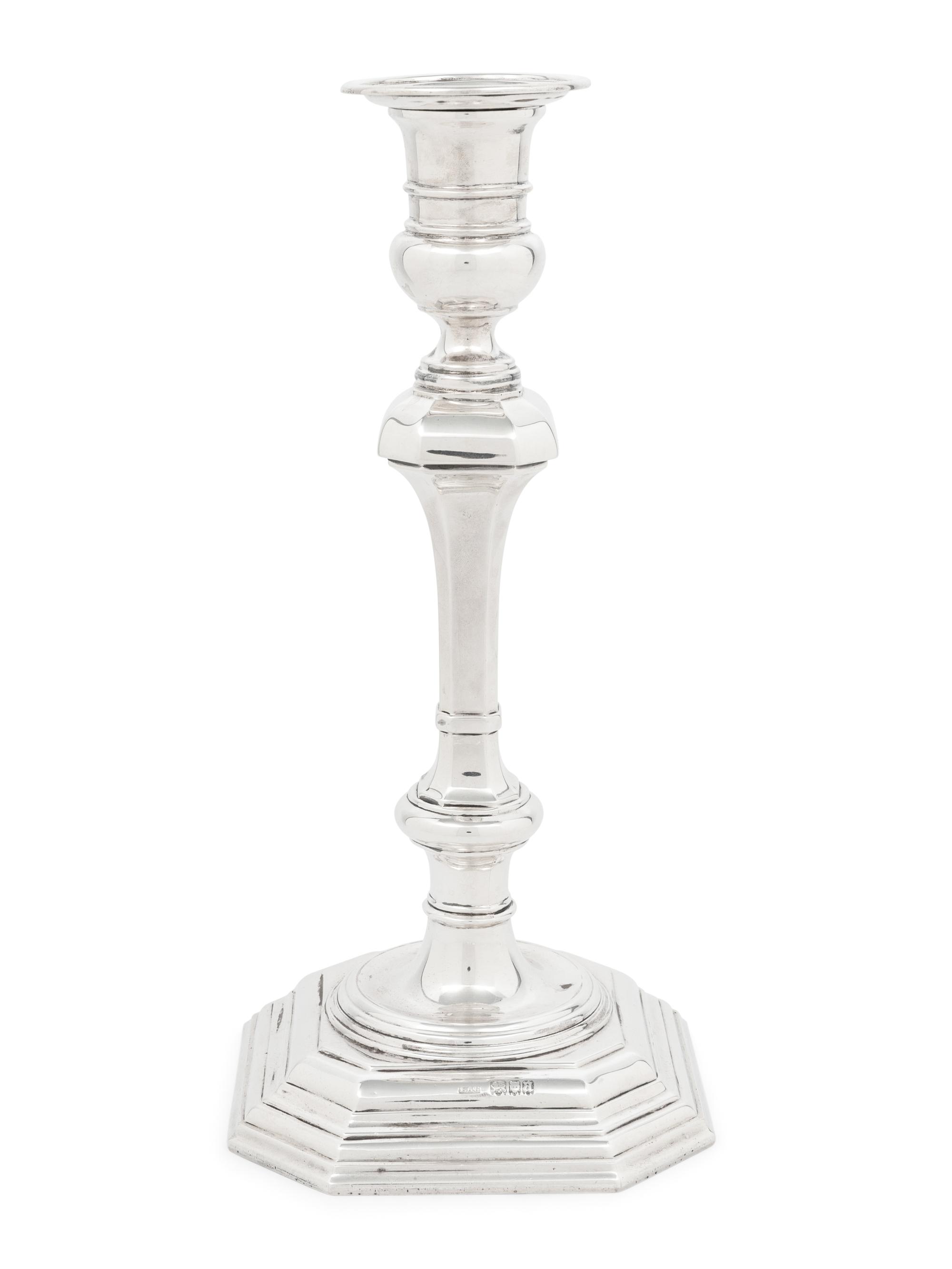 A Set of Four English Silver Candlesticks