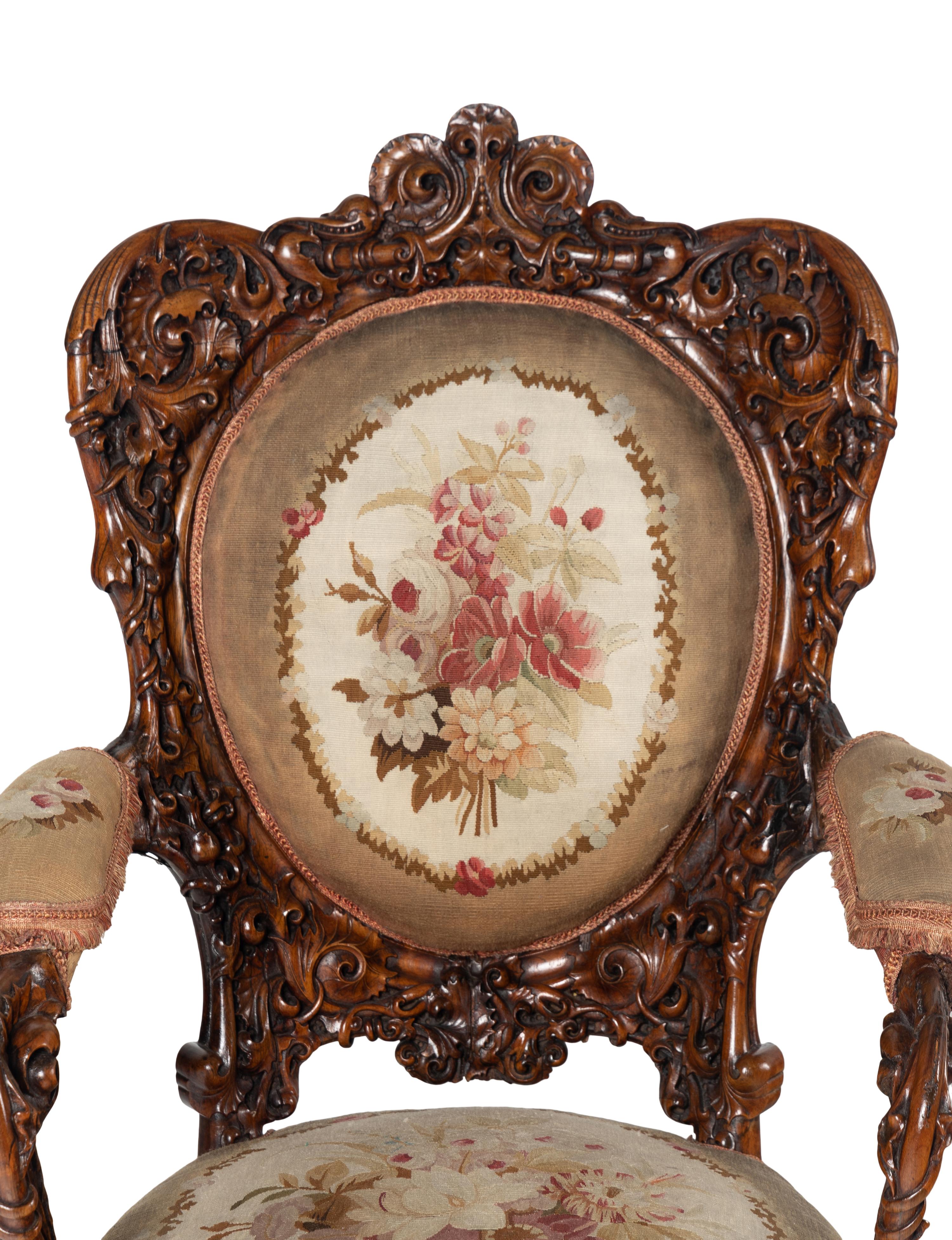A Pair of Rococo Revival Carved Rosewood Armchairs