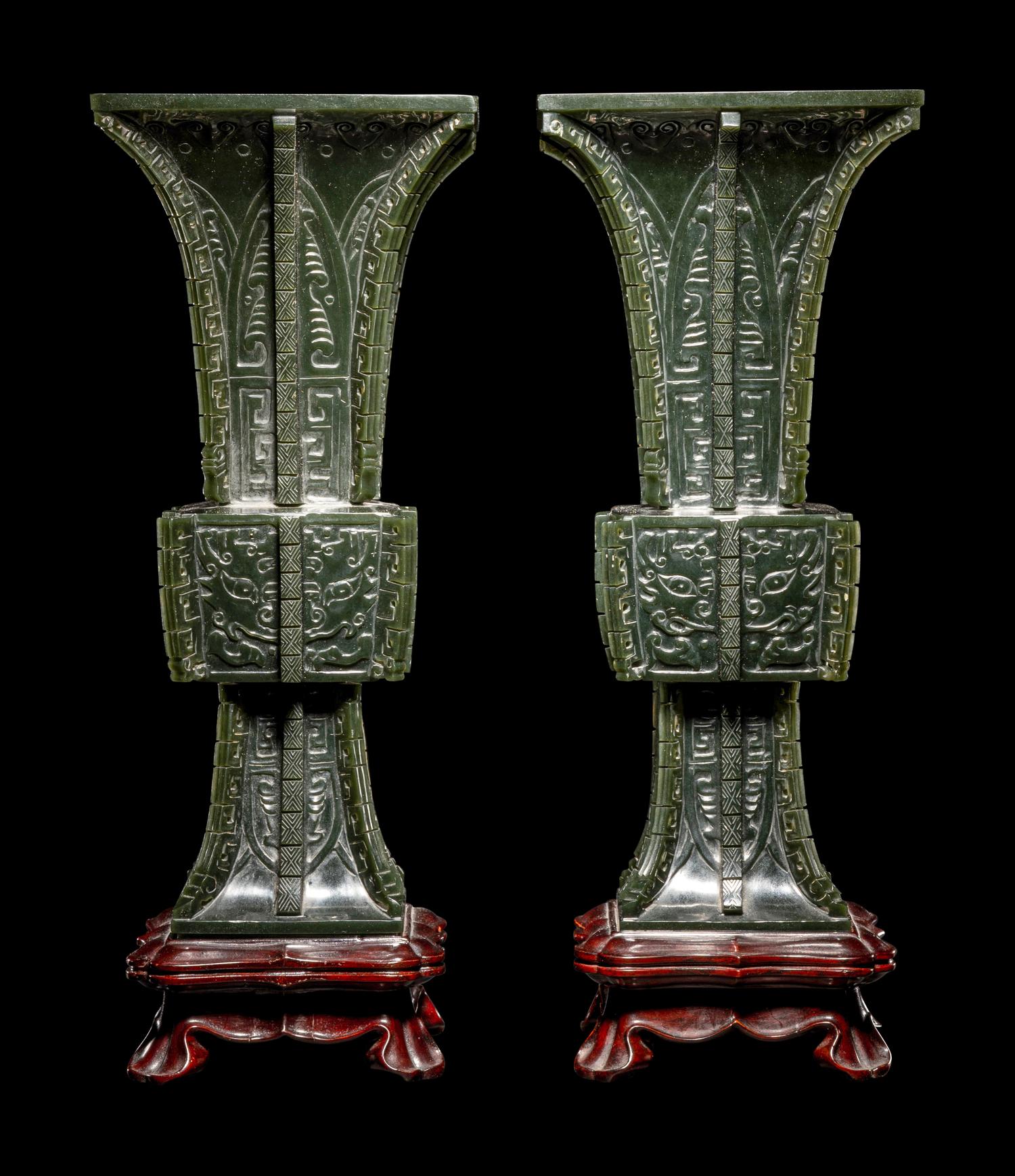 A Pair of Spinach Jade 'Taotie' Gu Vases