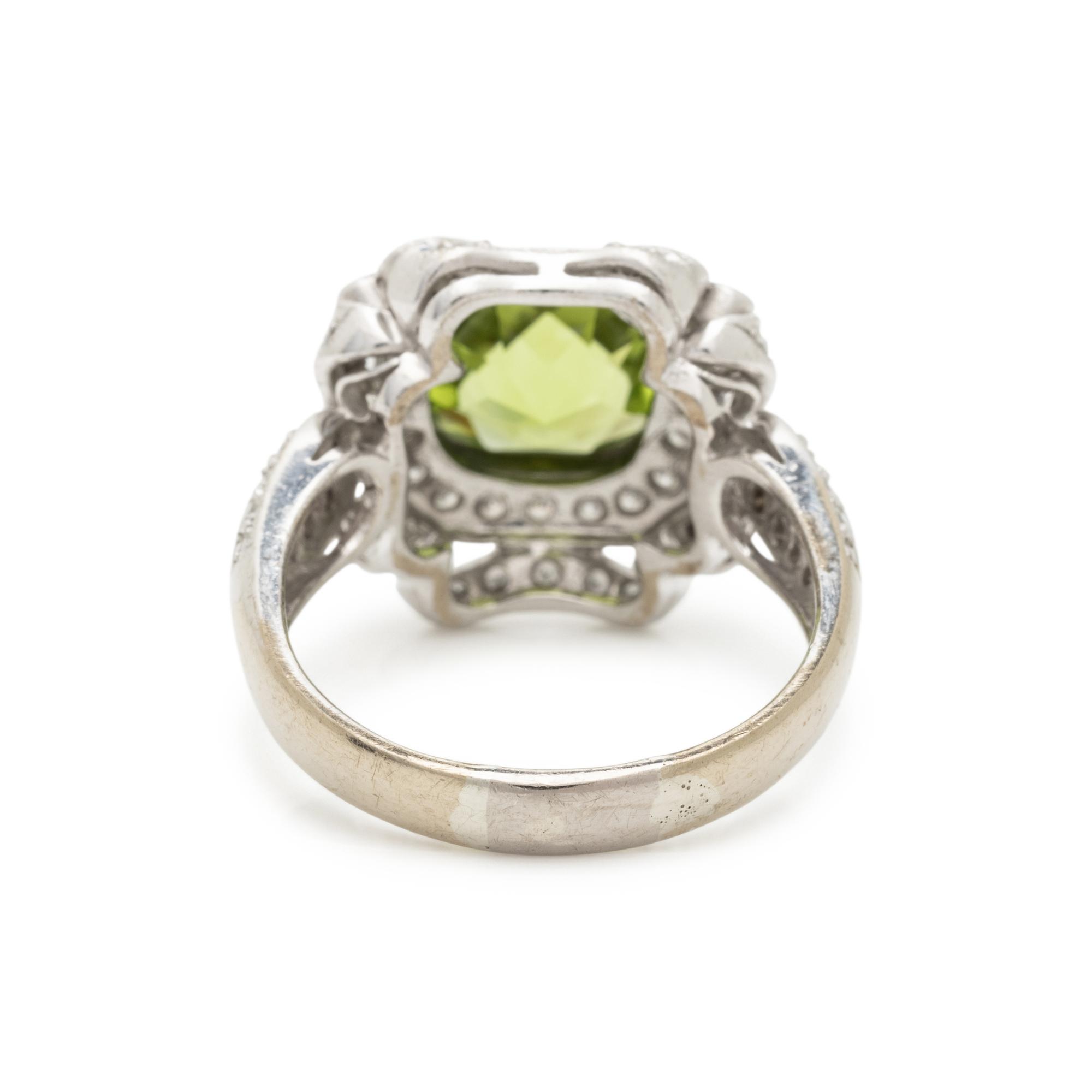 WHITE GOLD, DIAMOND, AND PERIDOT RING
