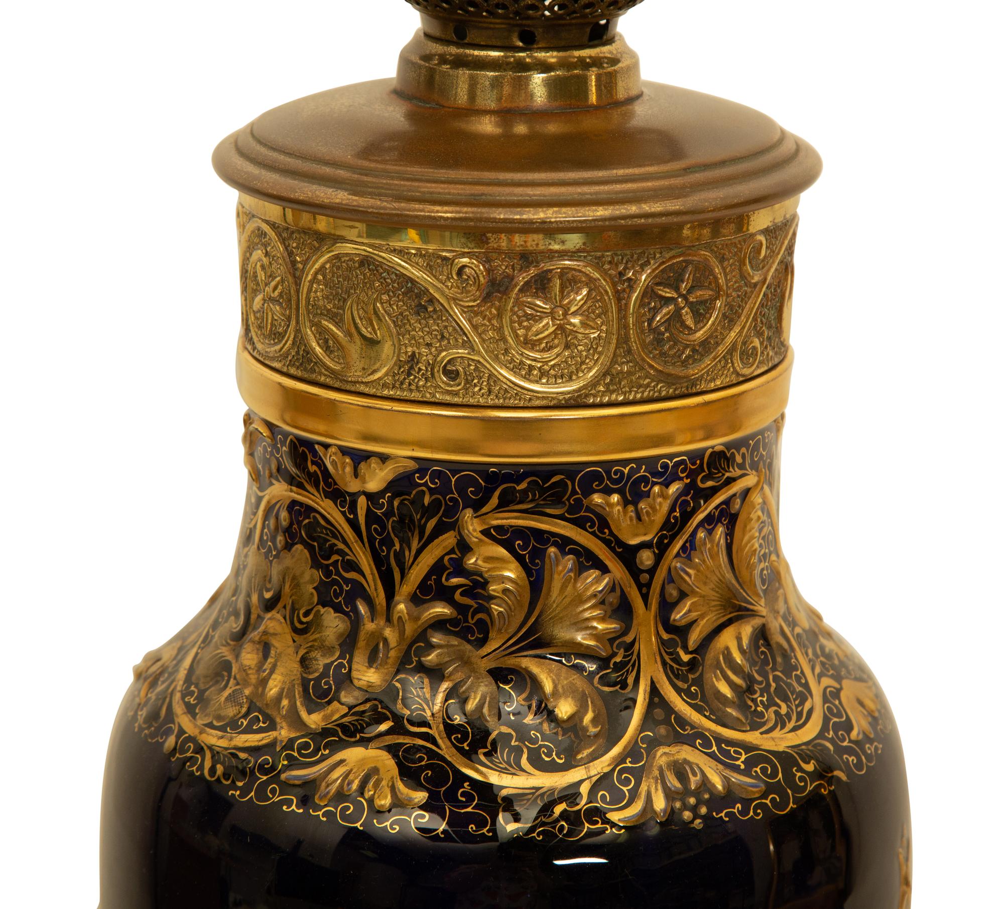 A Gilt Metal Mounted Cobalt and Gilt Decorated Porcelain Table Lamp