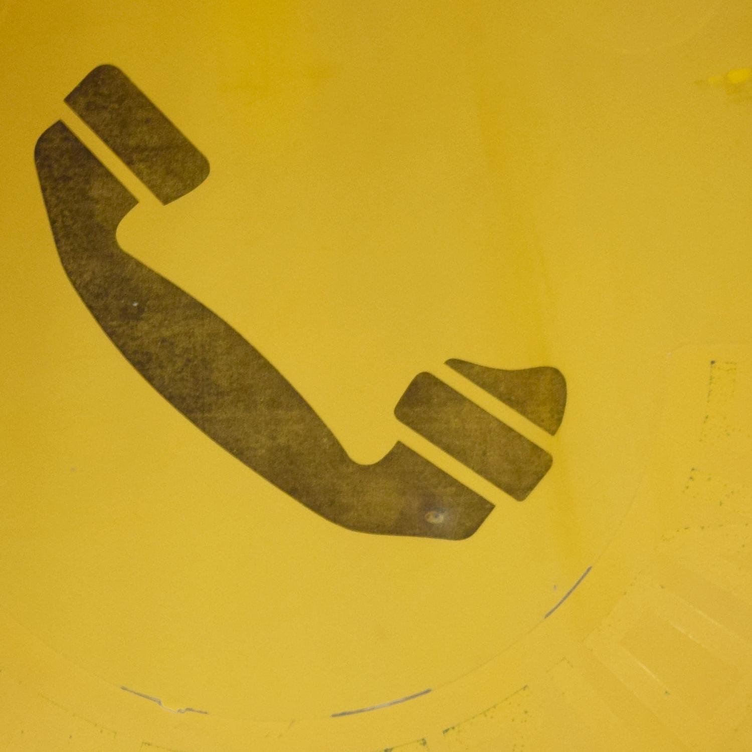 A Mid-Century Metal Telephone Sign 25" W x 12" D x 19" H — Italy, mid-20th Century