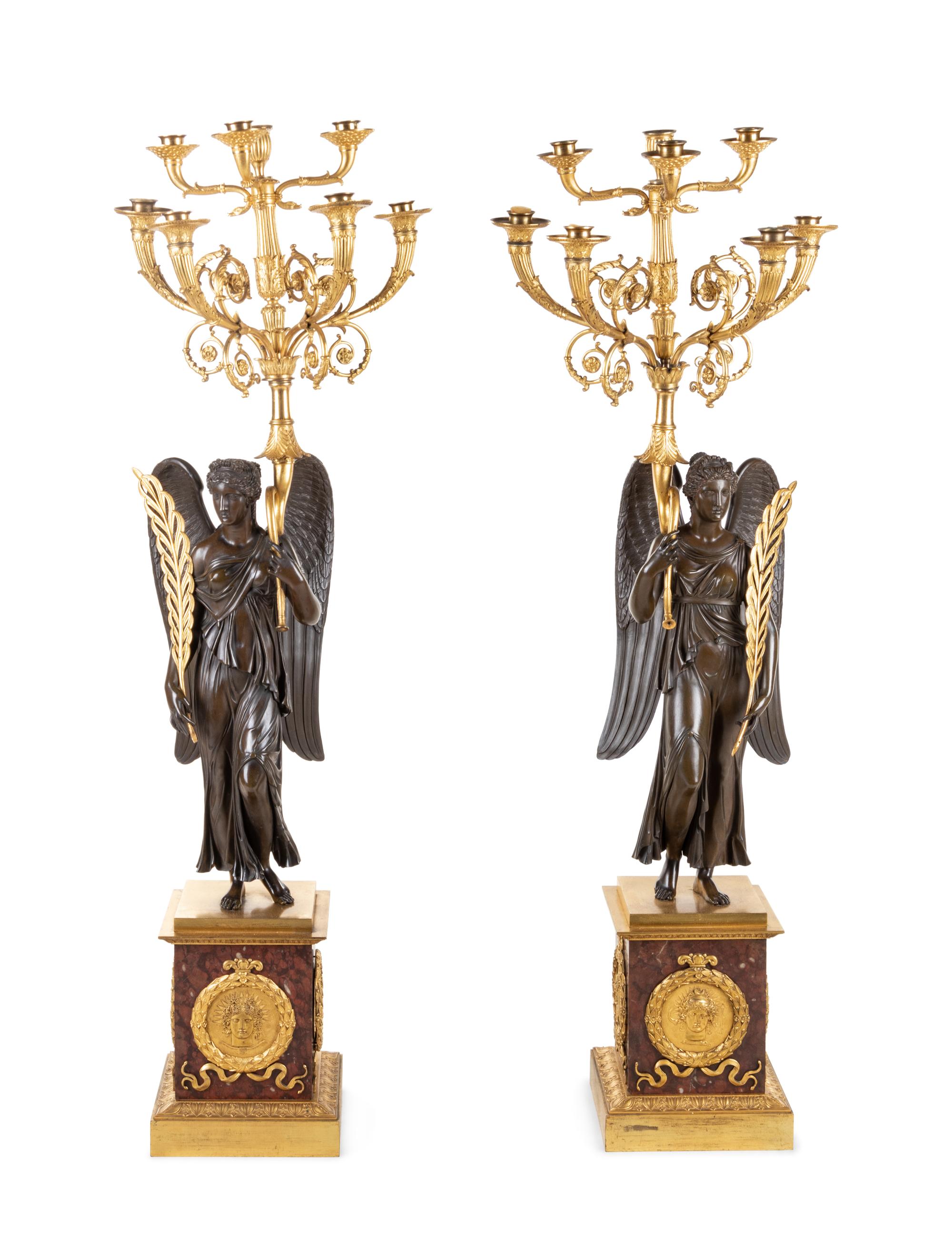 A Pair of Large Empire Style Gilt and Patinated Bronze Figural Eight-Light Candelabra, 19th Century
