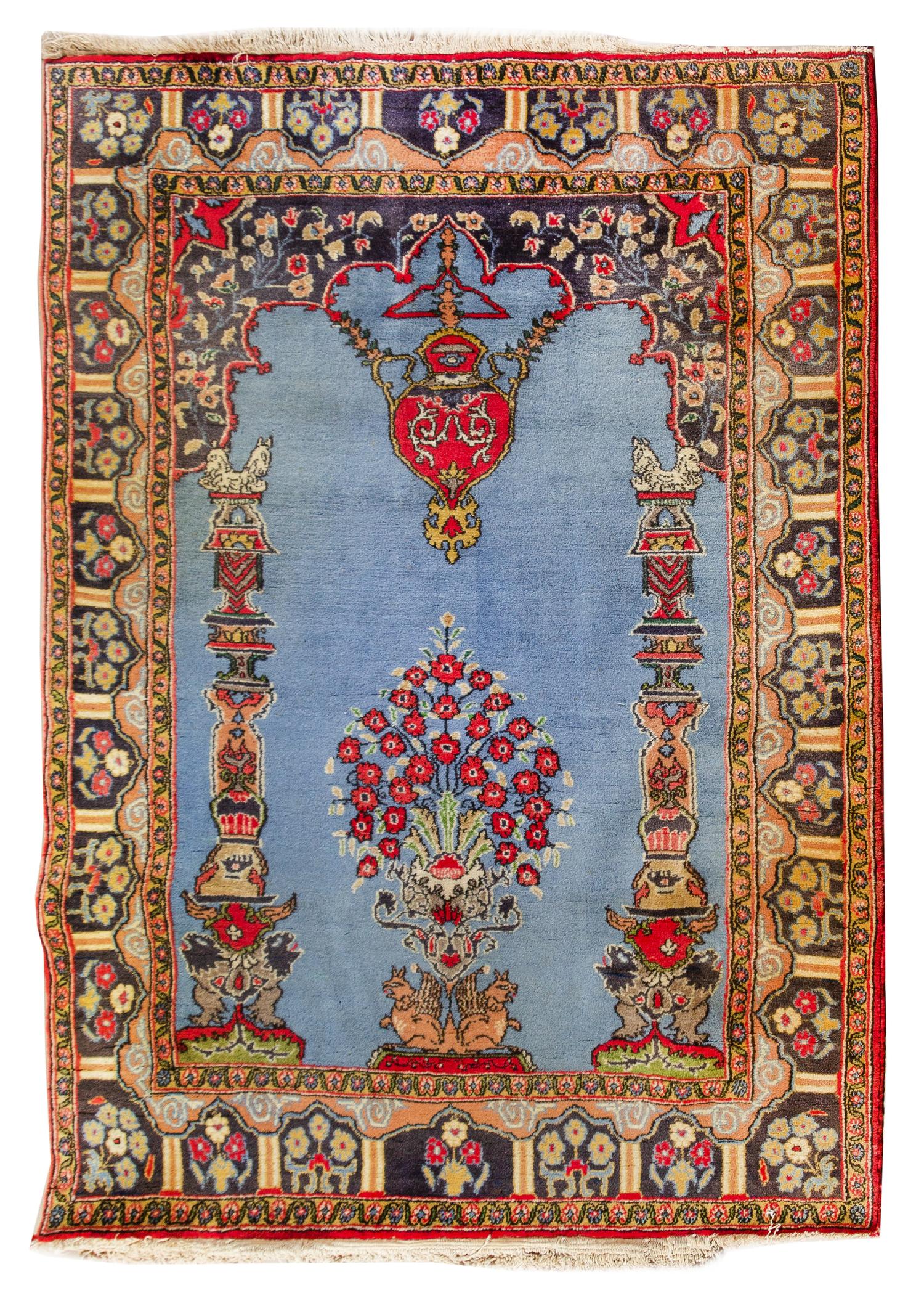 A Sino-Indian Wool Prayer Rug 4 feet 11 inches x 3 feet 6 3/4 inches. — 20TH CENTURY